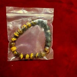 Mama bracelet’s. Tigers eye and volcanic rock